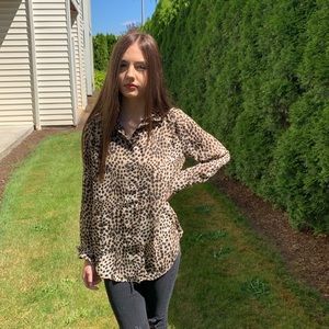 Leopard design blouse.  Polyester - comfortable and very light.